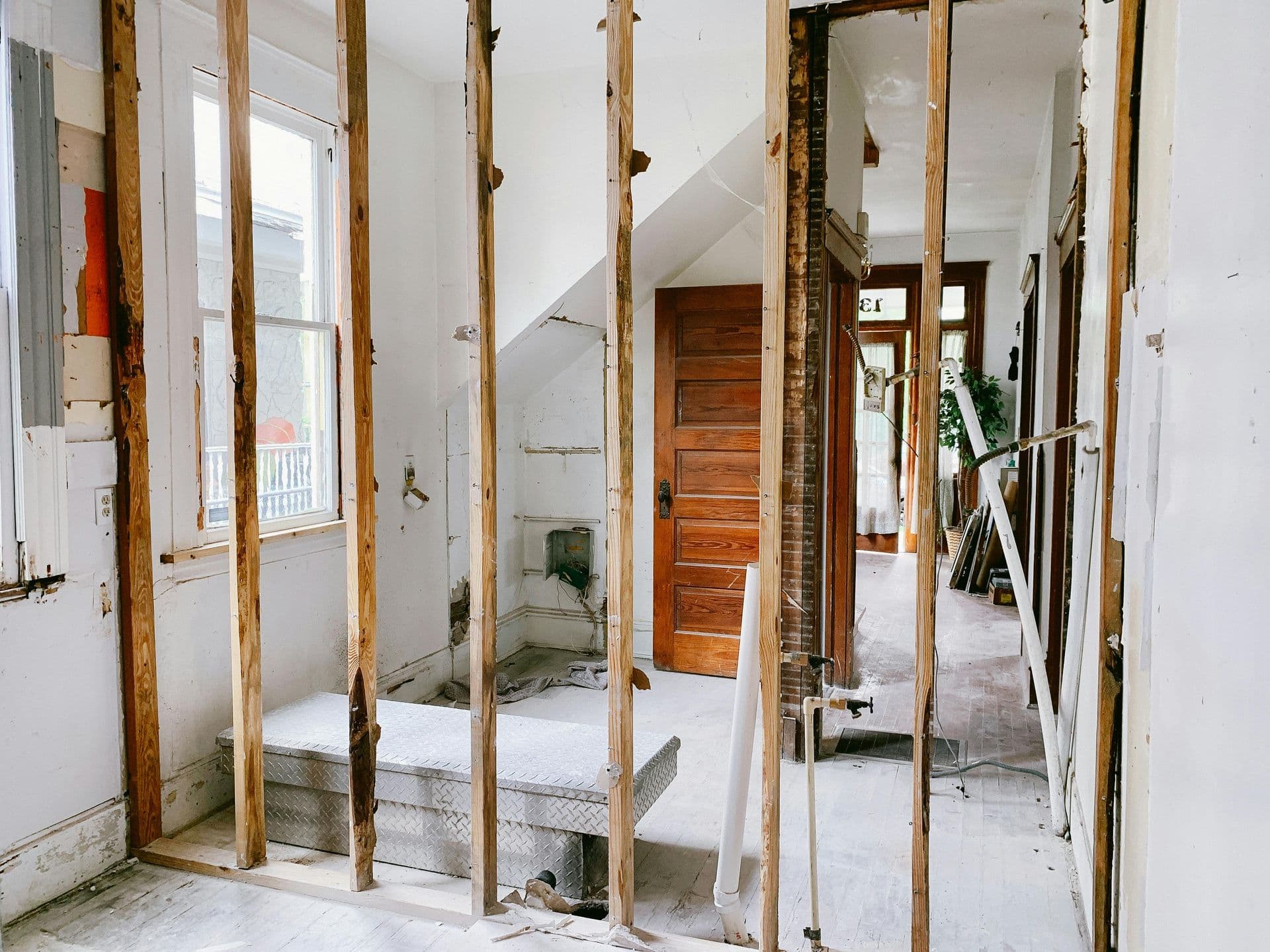 An interior stripped back to the studs during a remodel