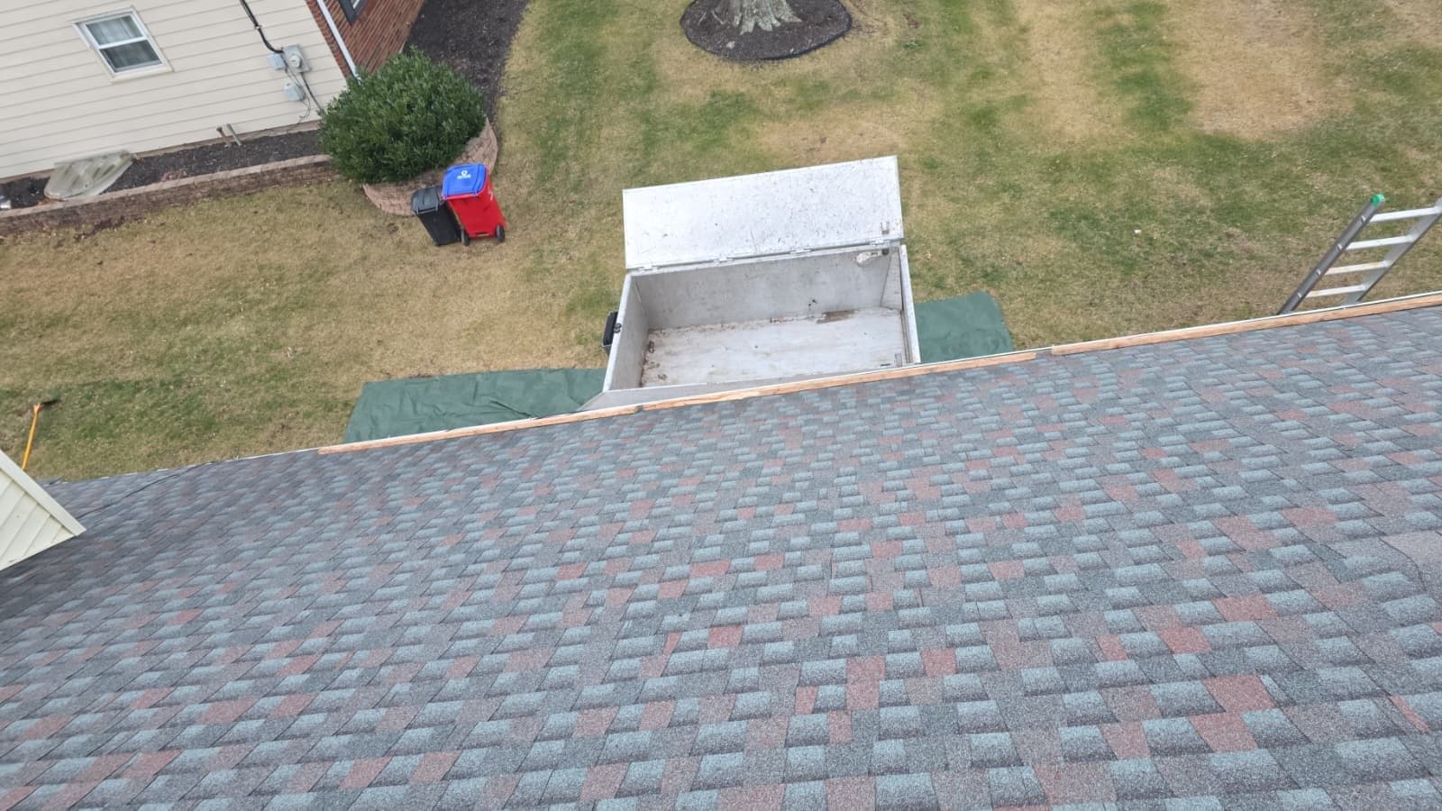 Completed grey architectural shingle roof